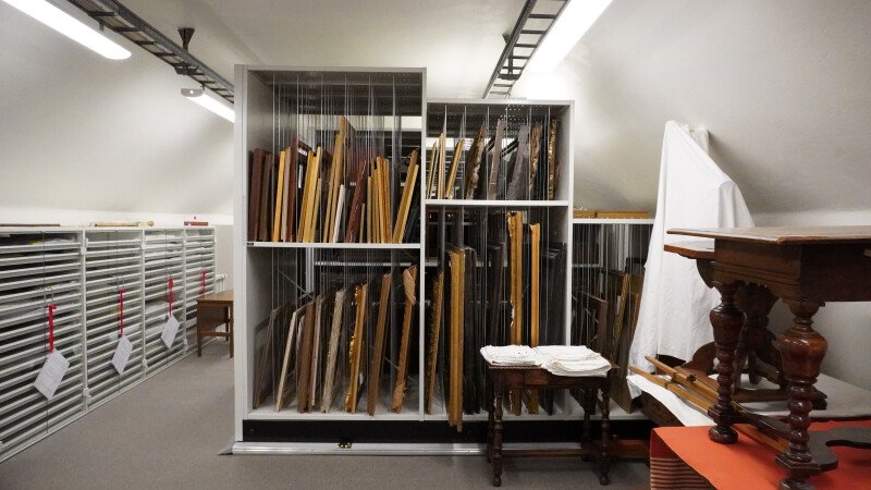 Cabinets with drawers and glass doors and dividers for frames