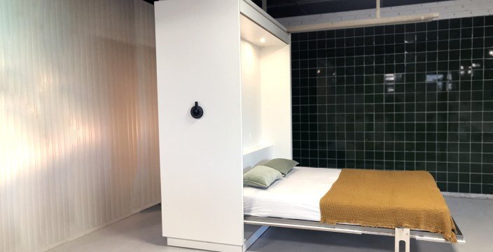 The flexible furniture wall: an innovative urban living project